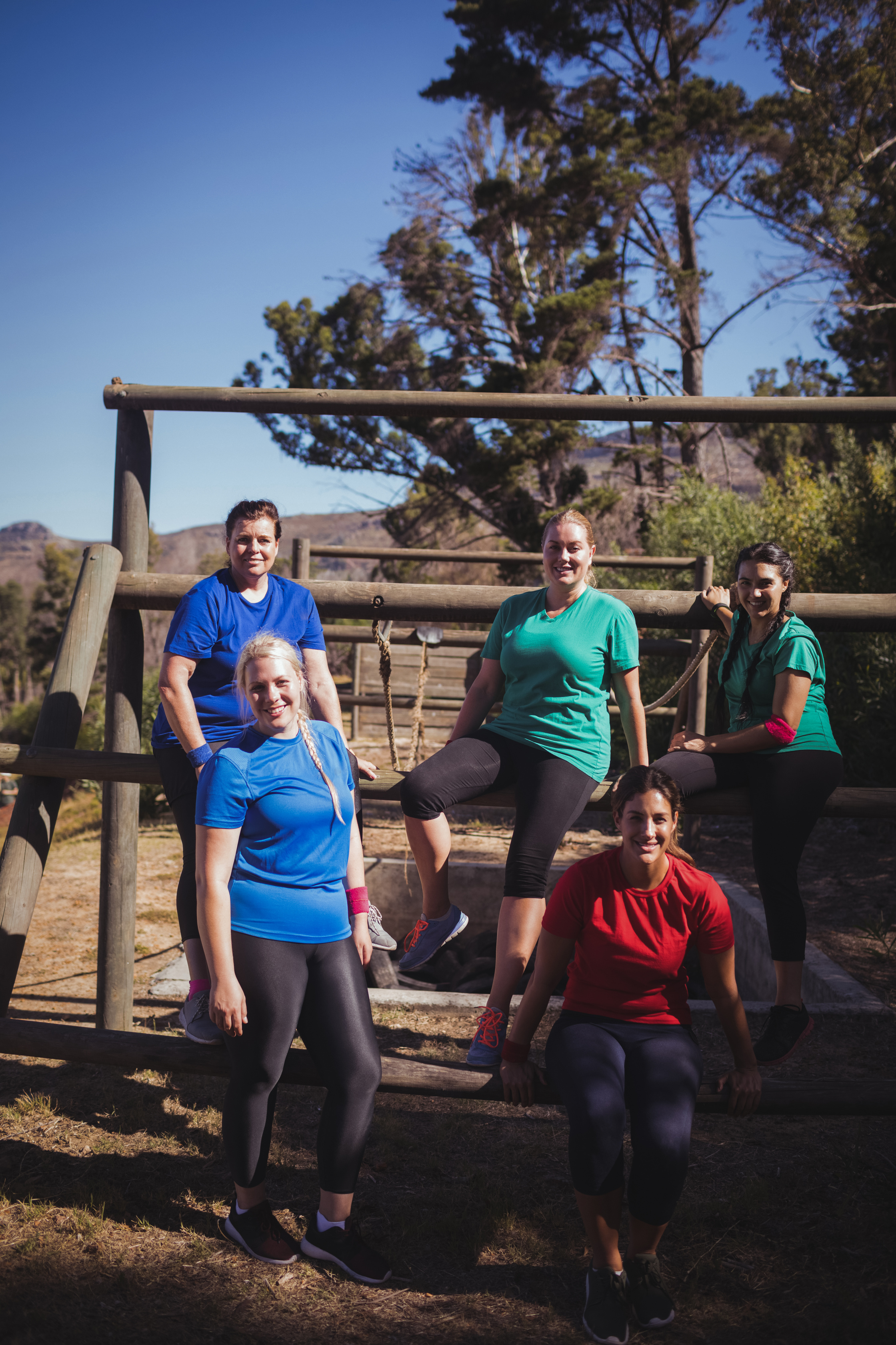 Group of fit women relaxing together in the boot camp